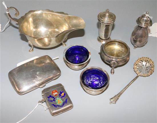 Silver cigarette case, vesta, cream jug, two peppers and a pair of salts and two plated items
